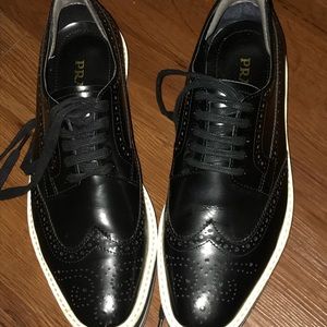 Prada wingtip platforms